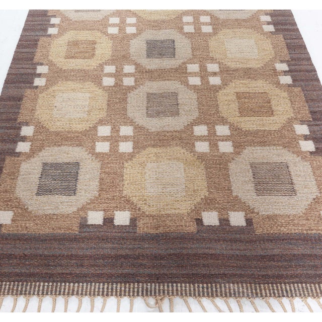 Vintage Swedish Flat Weave Rug by Rakel Carlander Size: 4'8" × 6'7" (142 × 200 cm) This exceptional vintage Swedish flat...