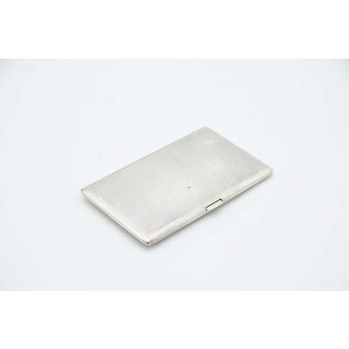 Rectangular Shaped Guilloche Silver Cigarette Case, in Very Good conditions. Designed 1990 to 1999 This piece has an...