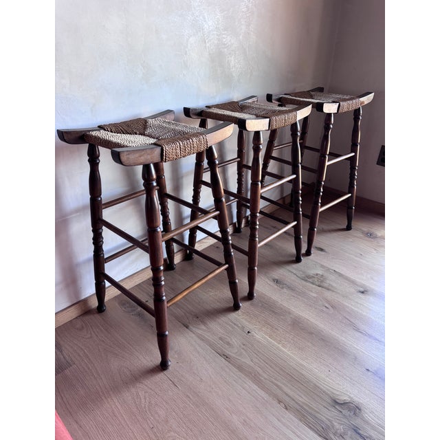 Wood Set of 3 Mid Century Bar Stools Primitive Craft Movement Turned Walnut Bobbin Spindle Legs and Danish Cording Woven Seats For Sale - Image 7 of 13