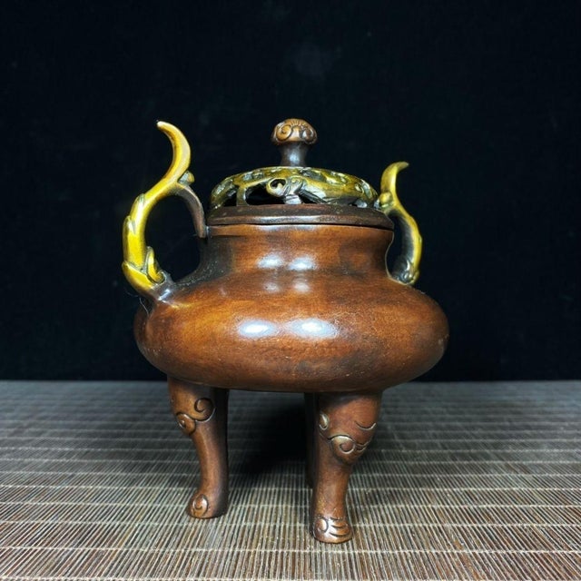 This is a finely cast vintage Chinese bronze censer, designed for burning incense. It features a compressed, rounded body...