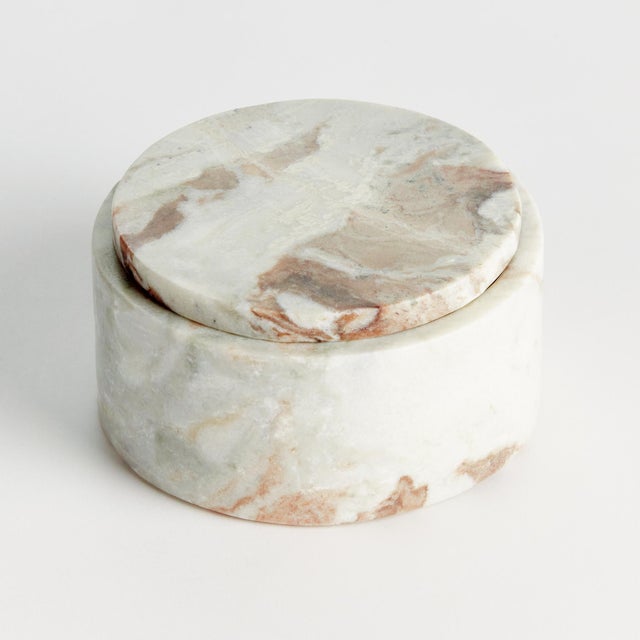 Honed to a semimatte finish, this stunning marble is specifically known for its unique darkBrown to lightBrown broad...