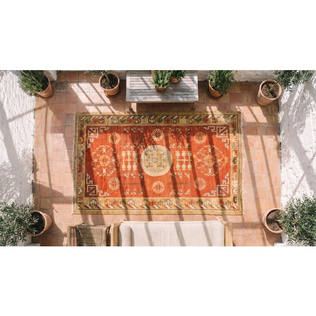 Textile 1920s Orange Medallion Rustic Central Asian Chinese Khotan Carpet 4' X 7' Handknotted Wool Rug For Sale - Image 7 of 8