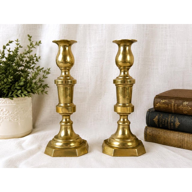 Bring timeless English-inspired elegance to your home with this handsome pair of vintage solid brass candlesticks. Crafted...