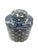 A pretty blue-and-white lidded jar with a timeless classic geometric floral pattern. A rich palette of deep blue and soft...