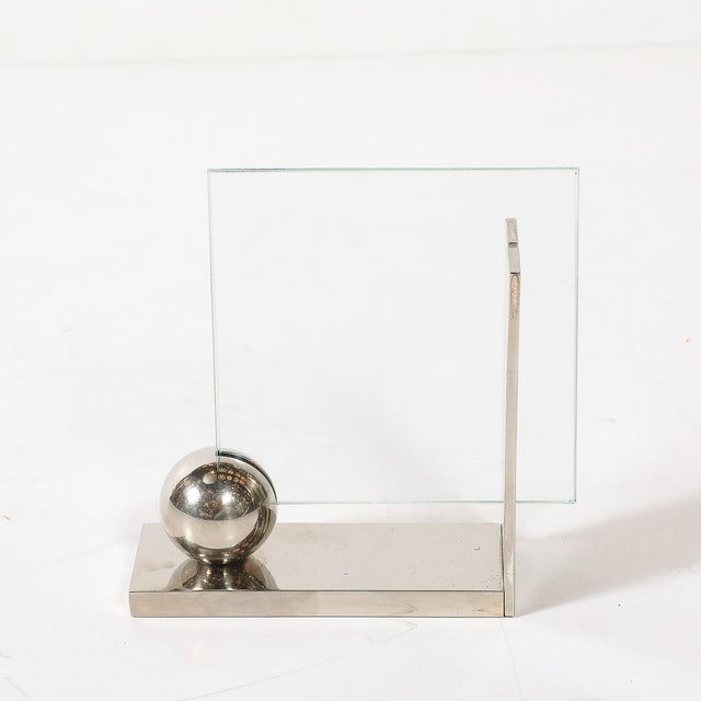 This Swid Powell silver-plated picture frame, crafted in the United States circa 1980, is a refined example of the design...