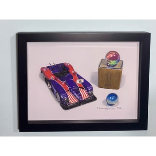 One Car by Irene Georgopoulou | Pastel Drawing of a race car with marbles and a block. For Sale