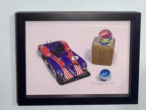 One Car by Irene Georgopoulou | Pastel Drawing of a race car with marbles and a block.