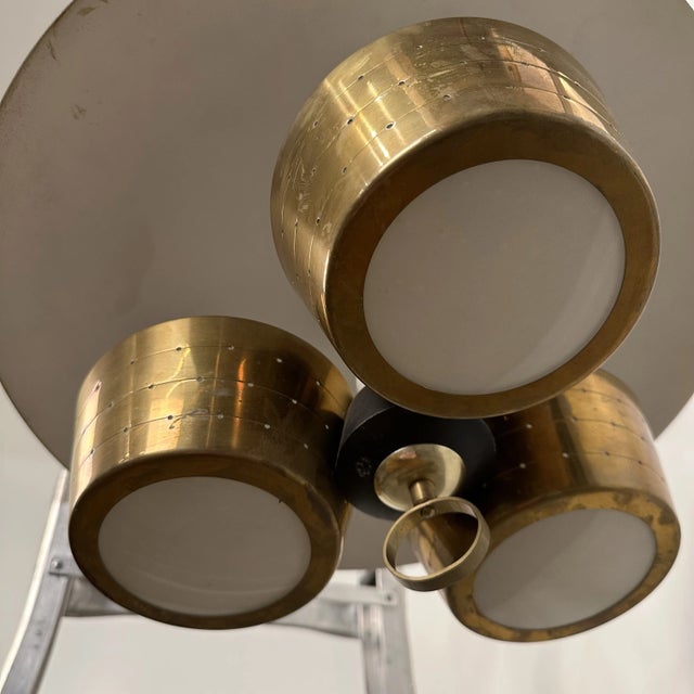 Mid century modern Gerald Thurston for Lightolier Pull Down Pendant Chandelier Ceiling Lamp Light. This lamp features 3...