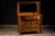 Substantial oak sideboard with attached mirror, built in the Empire Revival tradition and executed with pronounced...
