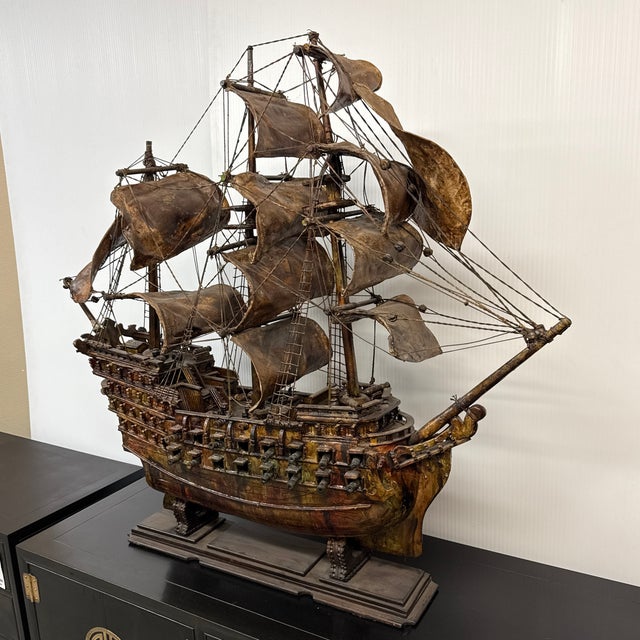 Design Plus Gallery presents a Large Scale Wooden Sailing Ship. The large detailed model of an 19th Century ship is likely...