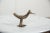 :: Vintage handmade African bronze flat billed bird. Circa mid 20th century and possibly older, this piece has such...