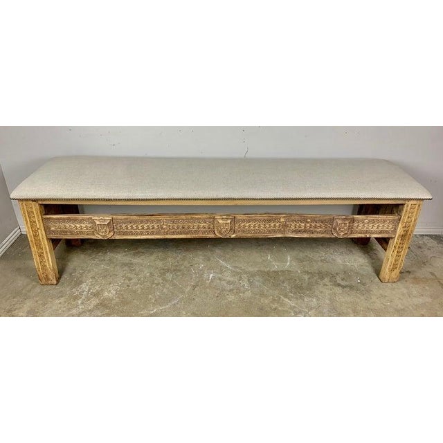 Early 19th century Spanish carved wood bench depicting beautiful detailed shields, fleur dys lis, and so much more. This...