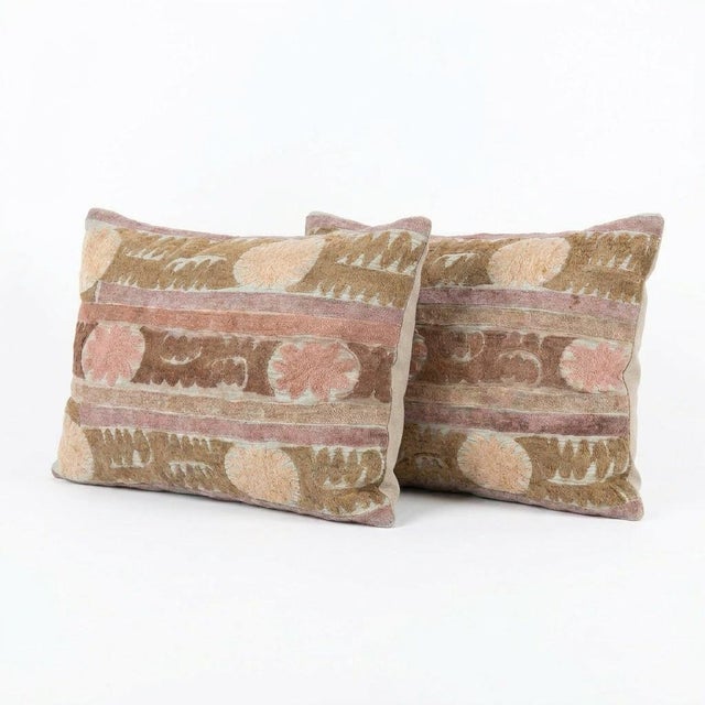 This beautiful 21'' x 25'' hand-embroidered Suzani pillow cover set was made from authentic Uzbek cotton fabric. The...