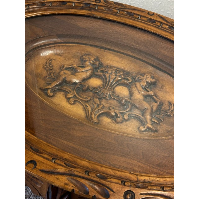 Antique French Renaissance Style Wood & Glass Top Tray Coffee Table with Carved Cherubs . Item featured a removable glass...