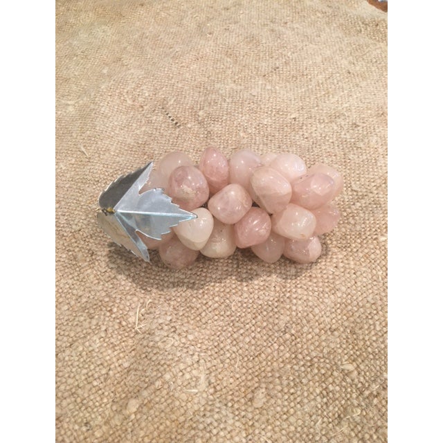 Polished Rose Quartz in natural individual shape. Grouped together to create a unique cluster reminiscent of grapes with a...