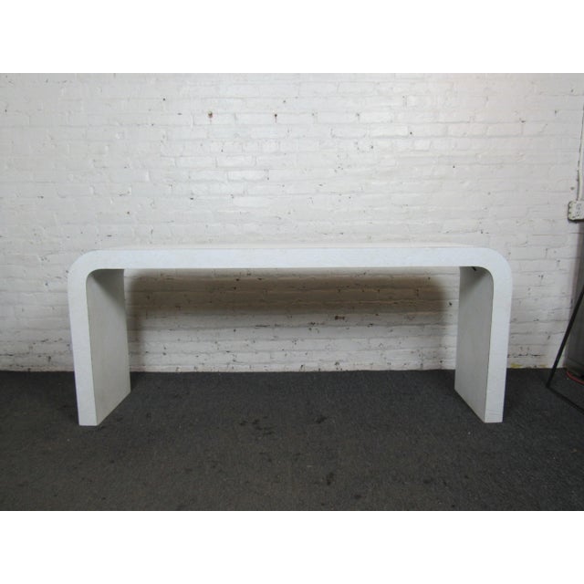 Classic Mid-Century Modern console table. Great arch design, in the style of Karl Springer.