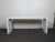 Classic Mid-Century Modern console table. Great arch design, in the style of Karl Springer.