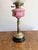 Pretty antique Victorian quality brass oil lamp having a quality brass oil lamp with a etched glass circular shade above a...