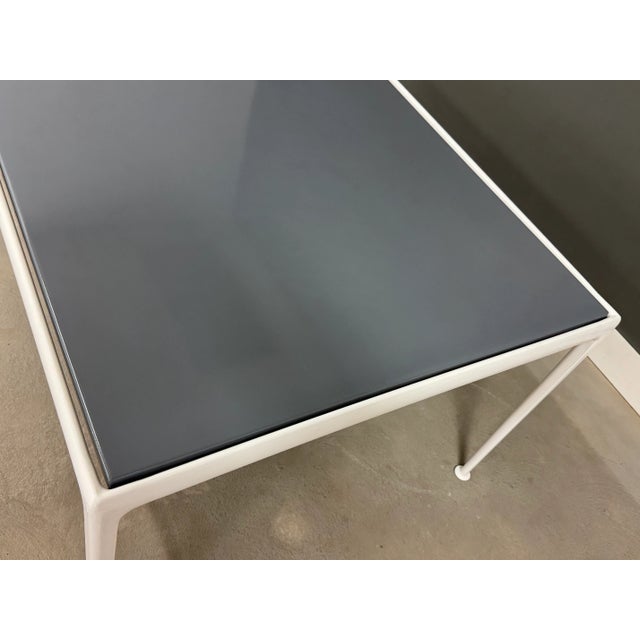 A mid century modern aluminum white powder coat rectangular dining table with a grey enamel steel top designed by Richard...