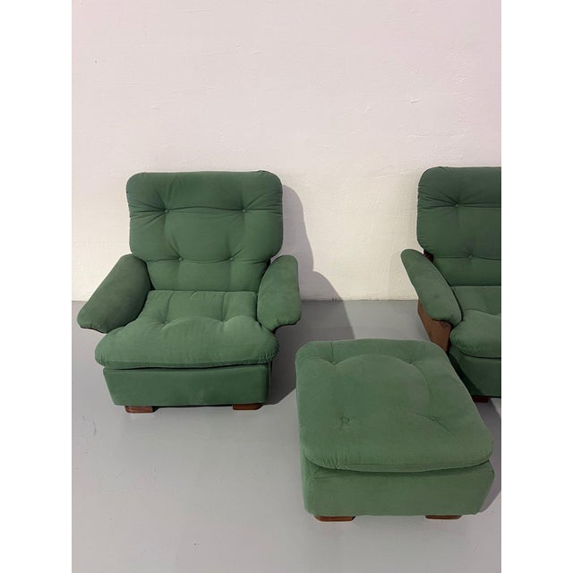 Set of two armchairs with ottomans produced by Cinova. The authentic vintage design dates back to the 1960s. The...