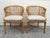 Pair of vintage McGuire rattan barrel-back armchairs, c.1980’s These chairs feature the classic curved spindle back in an...