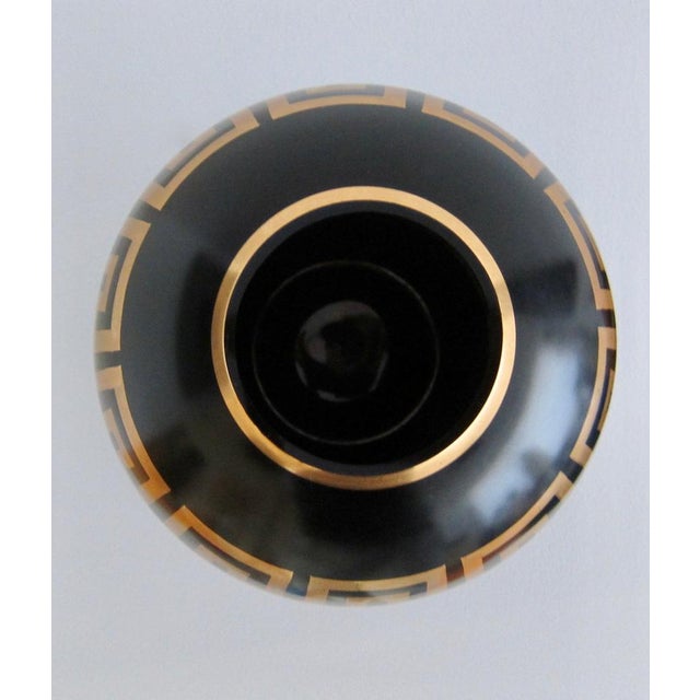 Very chic art-deco circular black opaline vase with hand-painted golden decor, circa 1930's. In perfect condition....