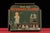 c. 1920s; The William Schollhorn Co. - New Haven, CT Painted tin lithograph countertop advertising display with attached...