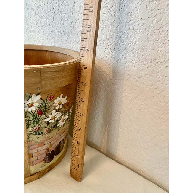 This vintage unique hand-painted wooden planter/basket/bucket features a pastoral floral design with daisies, butterflies,...