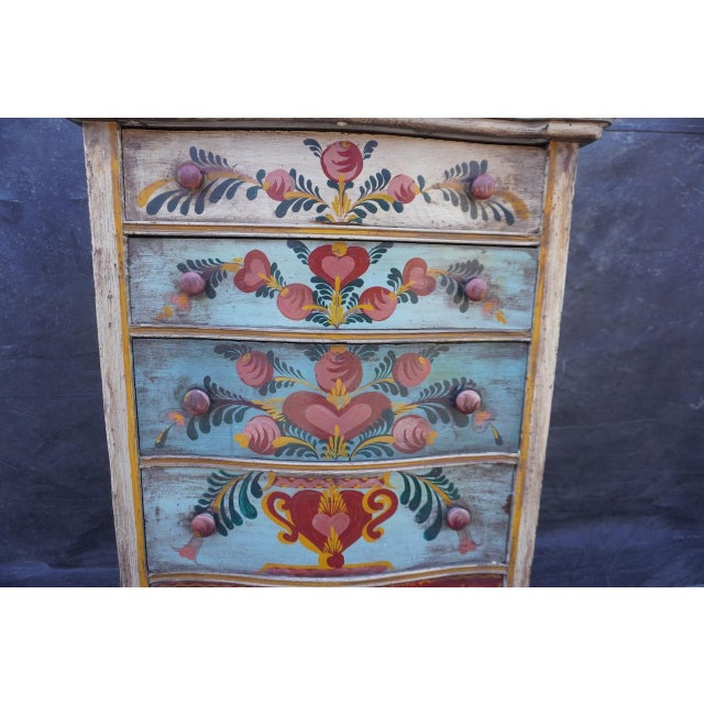 Measures 33 1/2" wide, 43 3/4" tall x 17 3/4" deep. Unmistakably his work.
