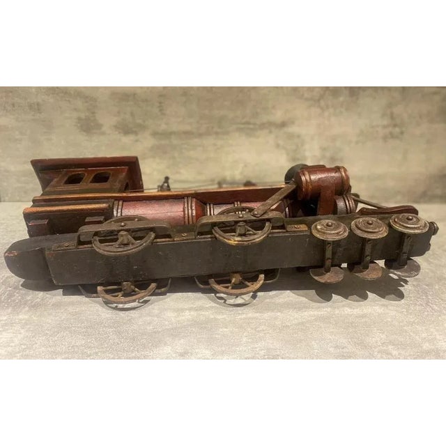 Very beautiful old miniature train. Ideal retro vintage decoration. Dimensions: height 33, width 66, depth 20.