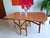 Introducing our stunning vintage Mid Century teak Gate Leg / Drop Leaf Dining Table! This beautiful piece sits on retro...