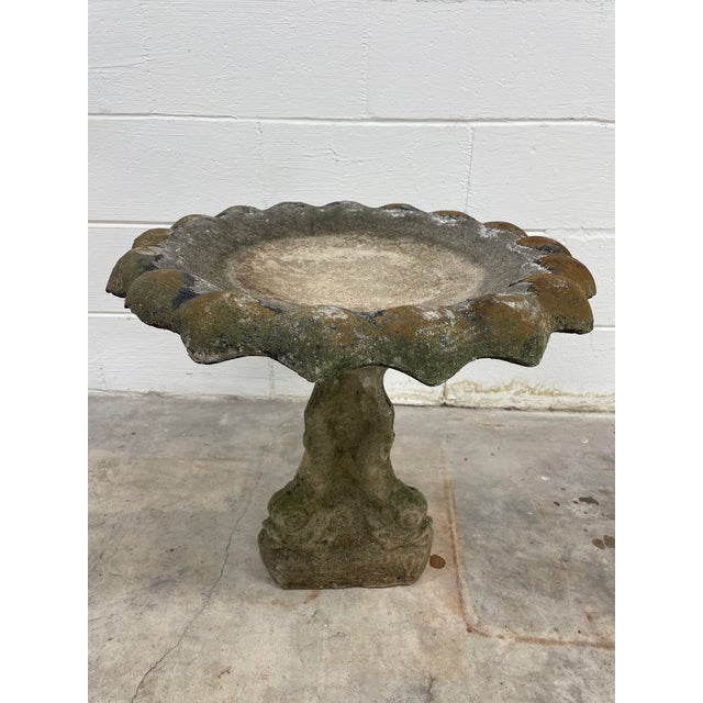 Beautiful scalloped bird bath 3" deep with sculpted fish base design on tripod base. Saved from a home and garden in New...