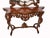 Gorgeous hand carved Italian console table and matching mirror set. Very intricately carved in the rococo style. Great for...
