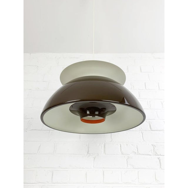 Pendant lamp from the Jutlandia series designed by Jørgen Høj (often spelled Jorgen Hoj) for Holmegaard in the 1970s. The...