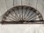 Antique wrought iron decorative Transom or window guard. Lovely half moon shape with detailed scroll work. It has been...
