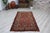This gorgeous hand knotted Vintage Anatolian area rug is approximately 60 years old in excellent vintage condition. The...