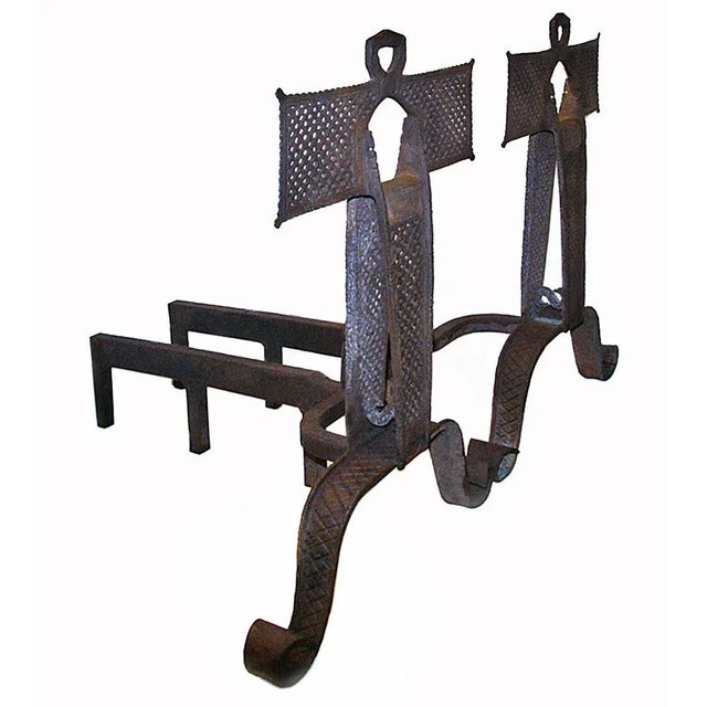 Rare pair of Arts and Crafts style andirons. A fine example of late 19th-century perforated metalwork.
