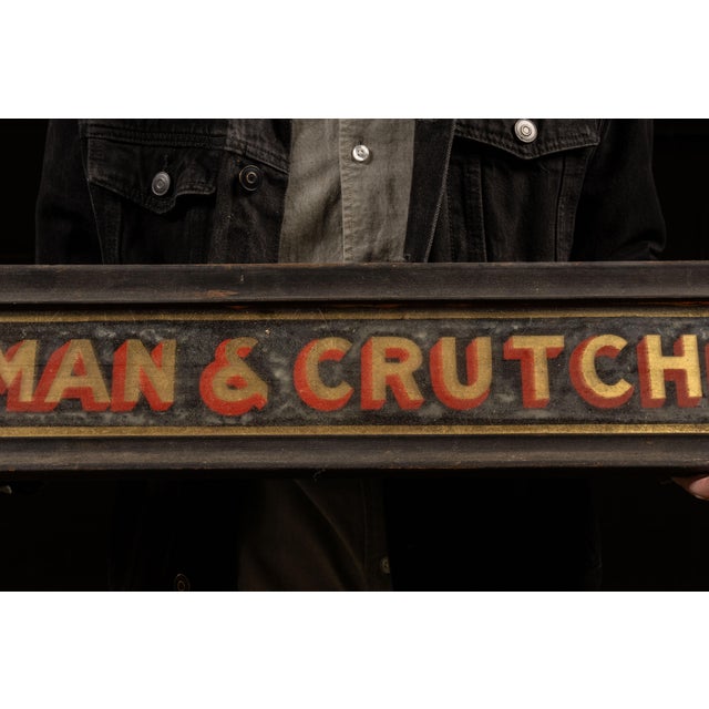 American 1918 Goodman and Crutchfield Reverse Painted Glass Sign For Sale - Image 3 of 5