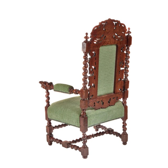 Large antique victorian quality carved oak throne armchair having a quality carved oak back with super barley twist...