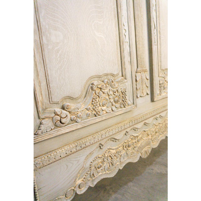 9th century Provoncial Armoire crafted from solid oak and restored in the 1950s. This stately piece showcases richly hand-...