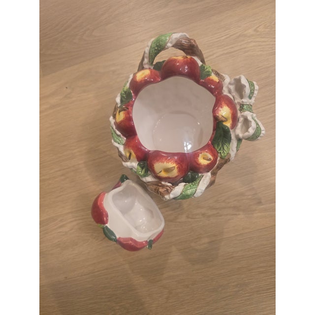 Ceramic decorative bowl with 3D red apples design.This decorative ceramic bowl featuring three-dimensional red apples is a...