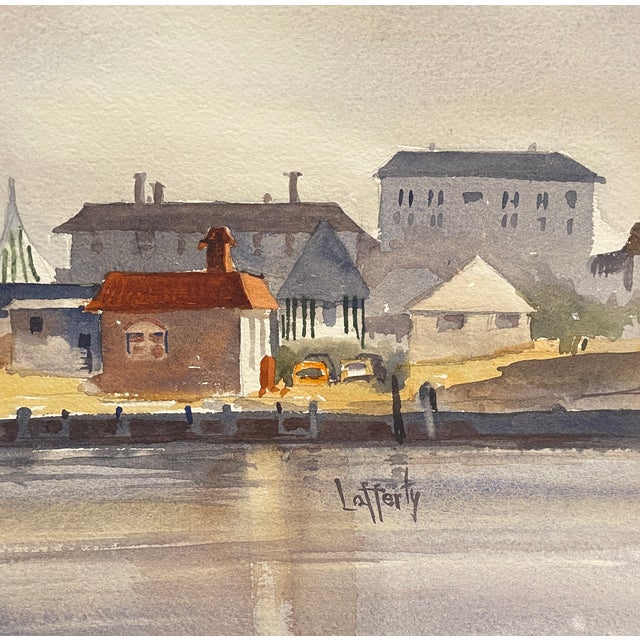 Coastal watercolor on paper of a town from the harbor. Signed Lafferty lower right. Found on the Eastern Shore of Virginia...