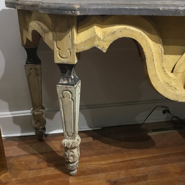 A true statement piece. Stunning Italian Baroque console, a serpentine gray wood top is supported by a substantial...