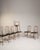 This exceptional set of twelve dining chairs embodies the graceful refinement of the Louis XV style, characterized by its...