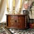 This mid-century Kellerman wooden jewelry armoire box features an architectural oval silhouette with functional sliding...