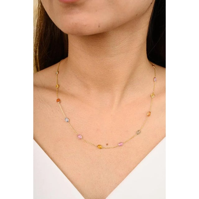 This is part of Chairish’s Fine Jewelry assortment. Certified Multi Sapphire Station Chain Necklace for Women in 18K Gold...