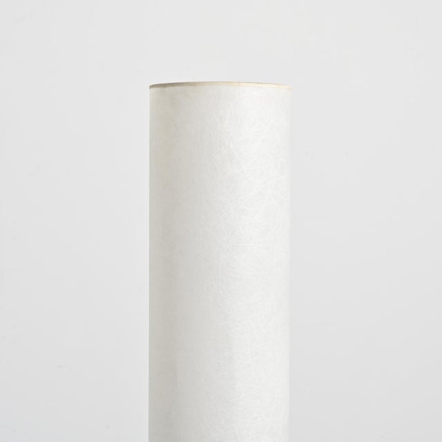 Floor lamp attributed to Temde, made circa 1970. Cylindrical diffuser made of rice paper mounted on a black lacquered...