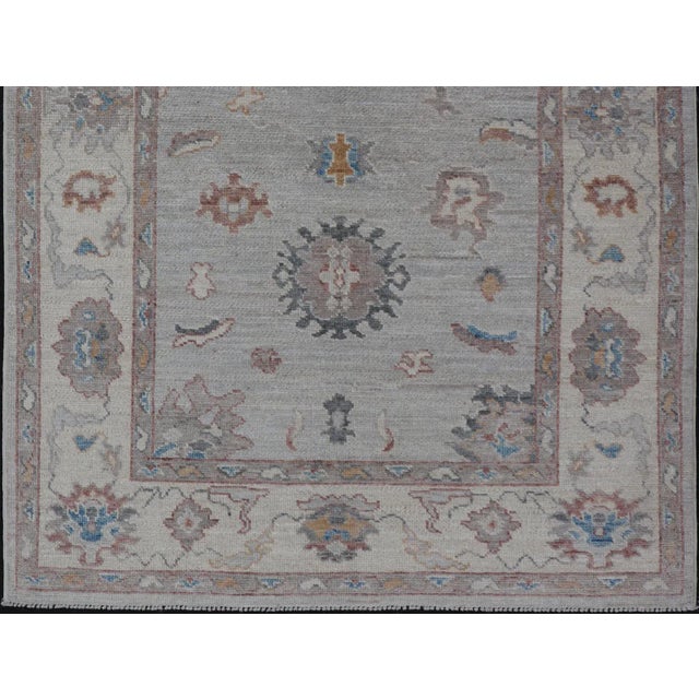 Floral Modern Oushak With Muted Gray Background and Cream Border For Sale - Image 10 of 13