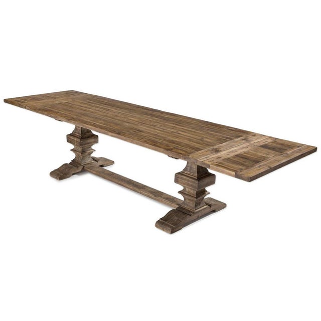 Bring timeless farmhouse elegance to your space with this substantial solid salvaged pine dining table with a subtle gray...