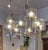 Rare chrome chandelier with grey transparent glass shades. Designed by Holger Johansson for Westal, Sweden mid1900s. A...